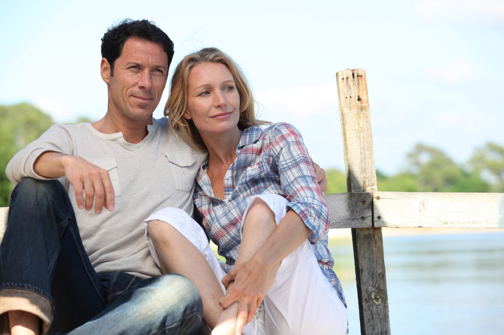 Couple relaxing on a pontoon