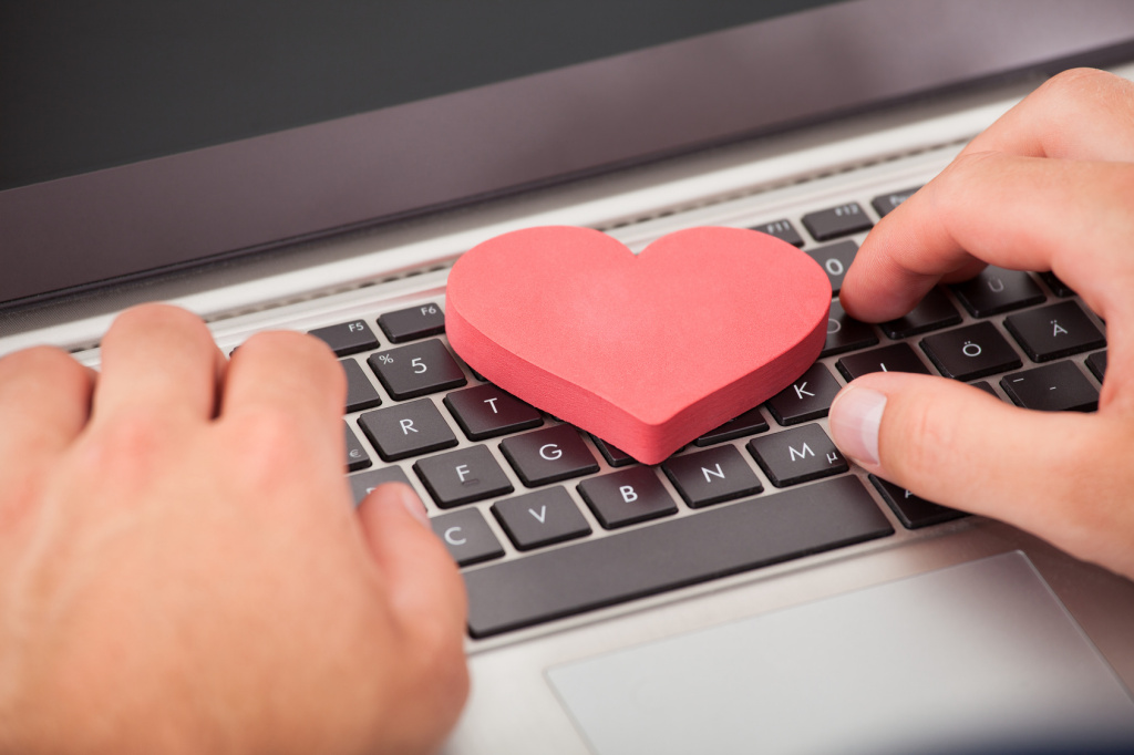 Man Dating Online On Laptop